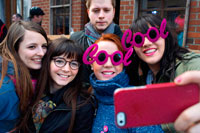 Binche festival carnival in Belgium Brussels. Teenagers taking selfies himself with pink fashion glasses of Cool. Music, dance, party and costumes in Binche Carnival. Ancient and representative cultural event of Wallonia, Belgium. The carnival of Binche is an event that takes place each year in the Belgian town of Binche during the Sunday, Monday, and Tuesday preceding Ash Wednesday. The carnival is the best known of several that take place in Belgium at the same time and has been proclaimed as a Masterpiece of the Oral and Intangible Heritage of Humanity listed by UNESCO. Its history dates back to approximately the 14th century.